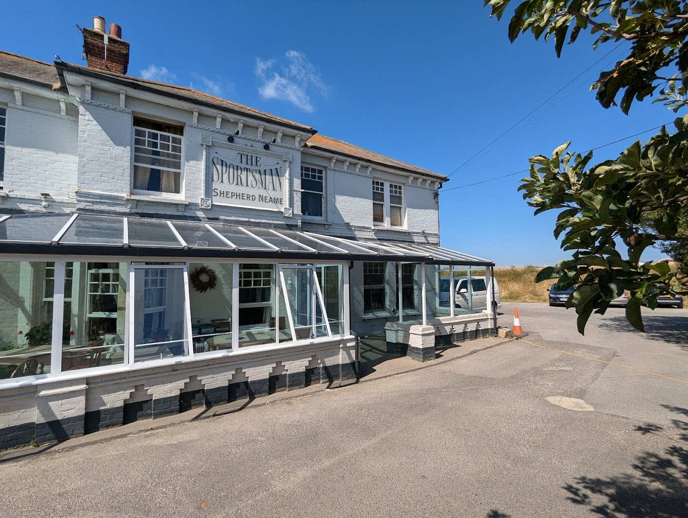 Exterior of The Sportsman, a Michelin star restaurant in Seasalter, Kent, located near the coast with rustic pub charm.